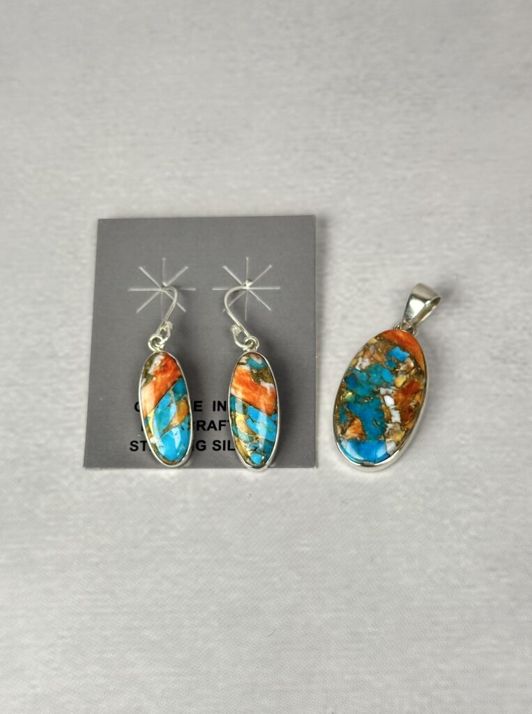 Matching sterling silver earring and pendant jewelry set