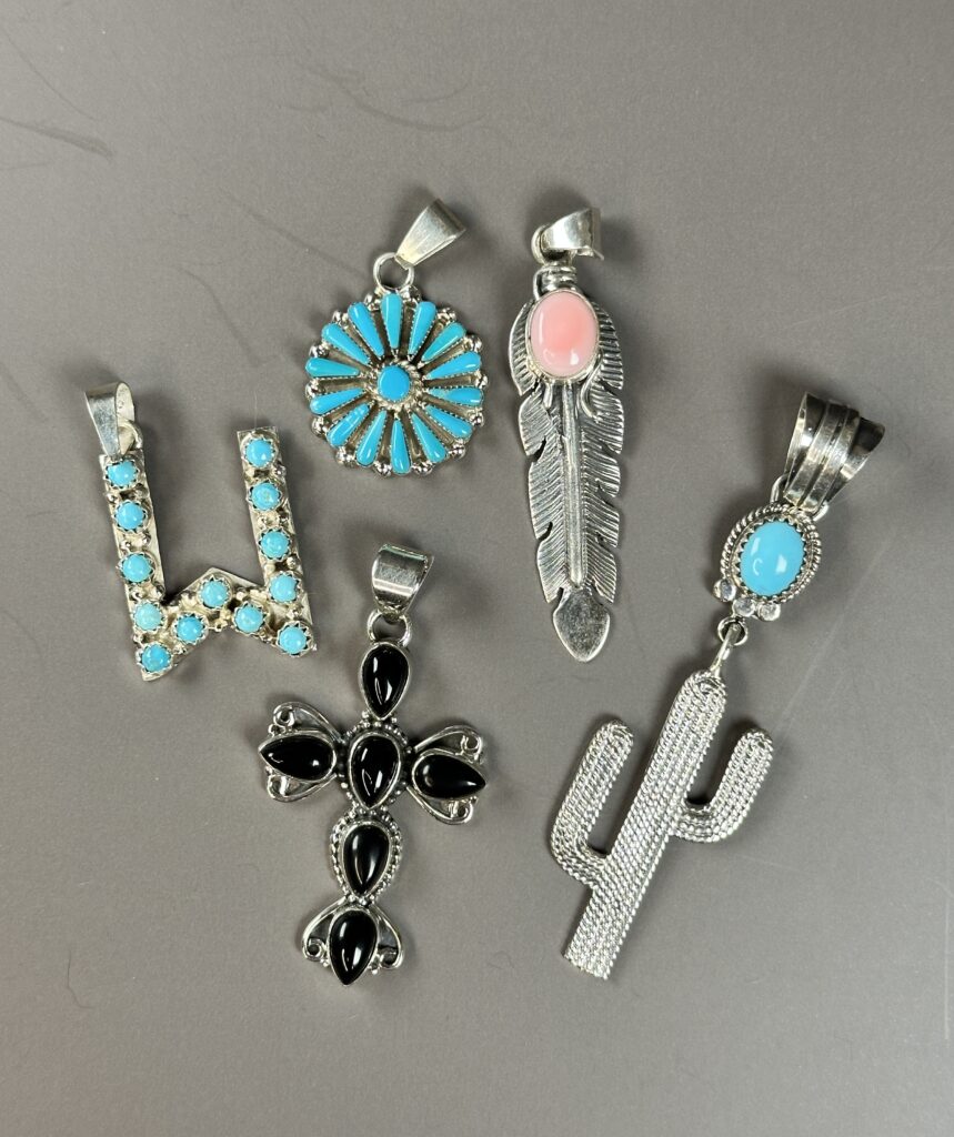 Sterling silver pendants with turquoise, onyx and spiny oyster