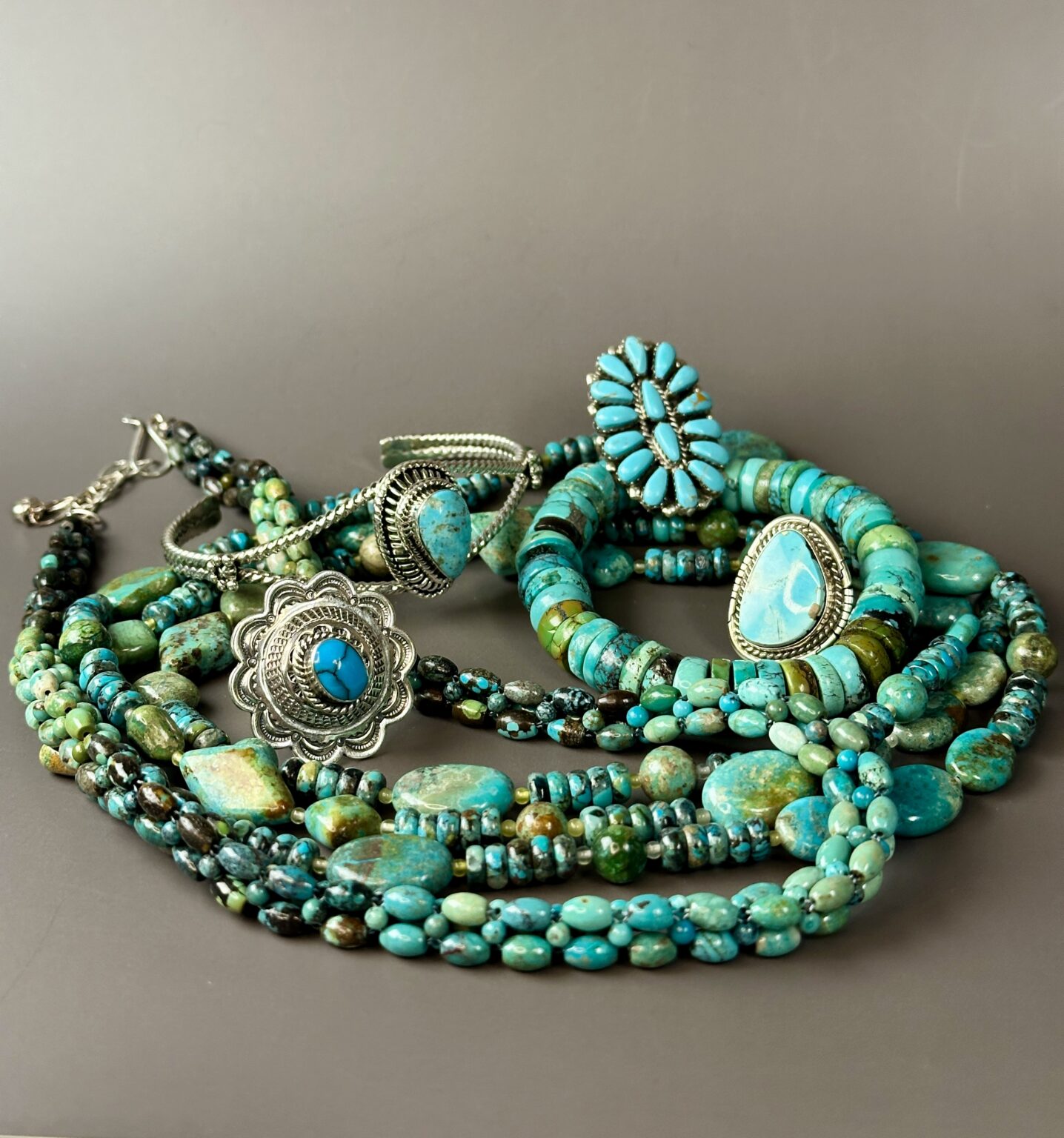 Handmade turquoise and sterling silver jewelry: cluster rings, cuffs and turquoise bead necklaces