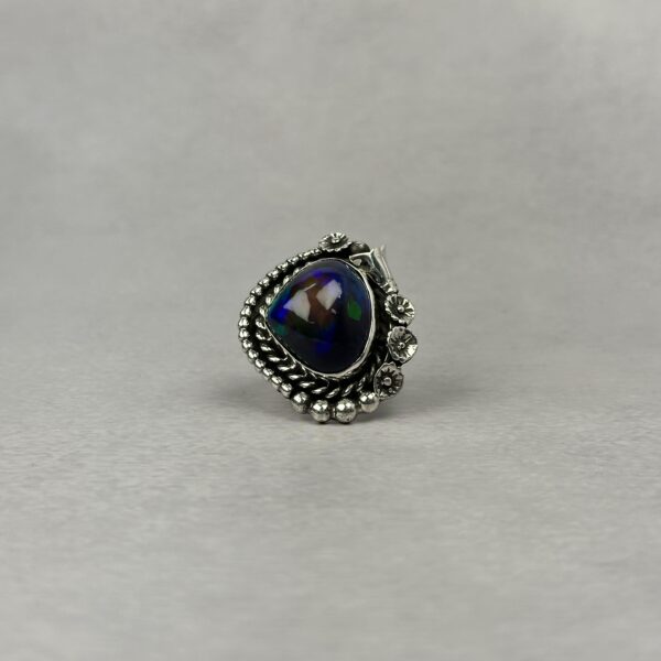Dark opal ring in sterling silver with flower and bead detail